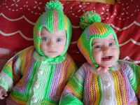 Вязаная кофточка для новорожденного